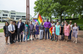 Group of residents with LGBTQ flag at the Lakefront