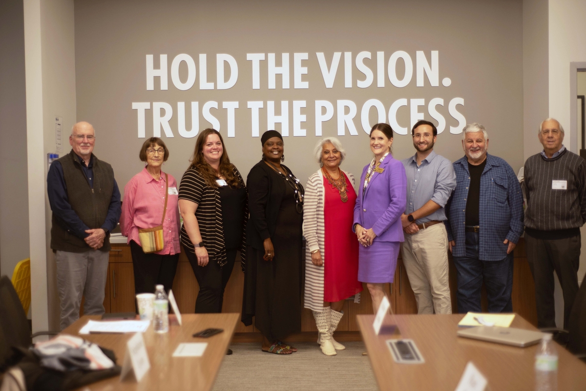 Commission on Aging members group photo in board room 