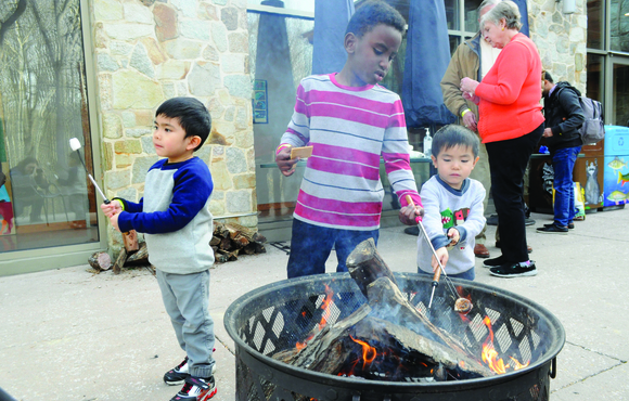 fire pit with kids around