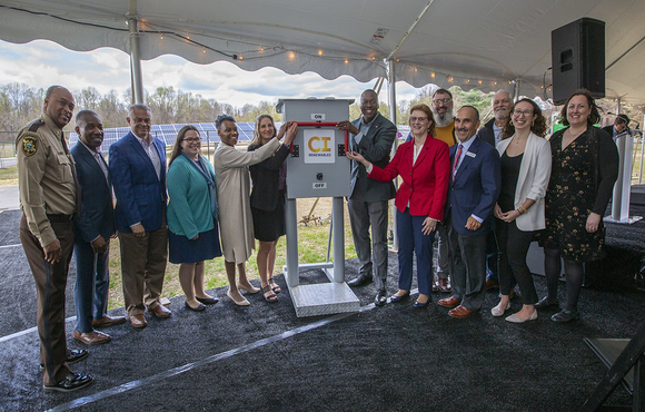 Image of local officials turning on the solar array at the circuit courthouse