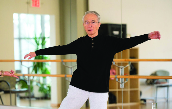 older man exercising in a studio