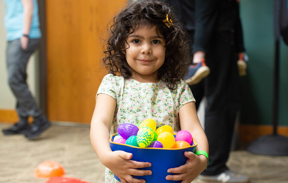 Eggstravaganza event holding eggs