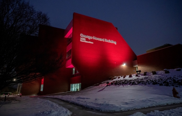 Image of the County's George Howard Building lit in burgundy color lighting in support of the Washington Commanders as they head into the 2024 season NFC Championship game in their bid for Super Bowl LIX.