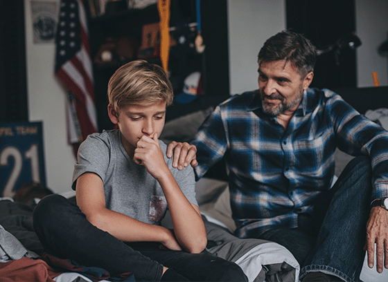 Man having a conversation with his son