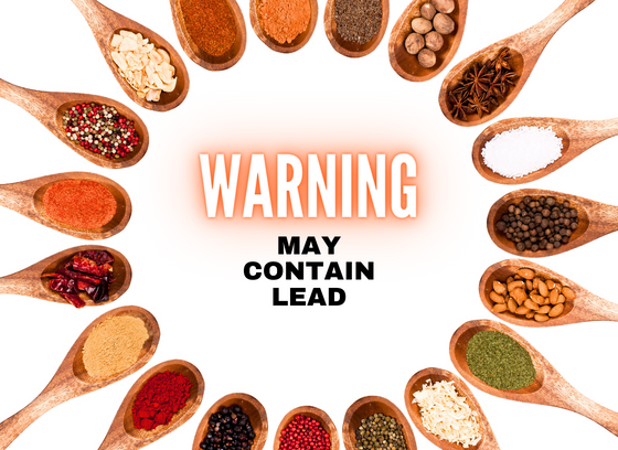 spoons holding a variety of colorful spices. "Warning, may contain lead"
