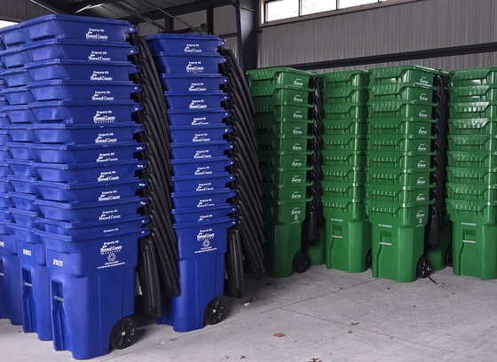 stacked blue and green carts