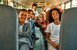 Students sitting on a bus