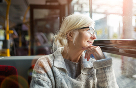 Older adult on bus