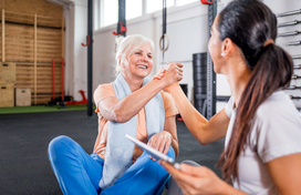 Personal trainer with older adult