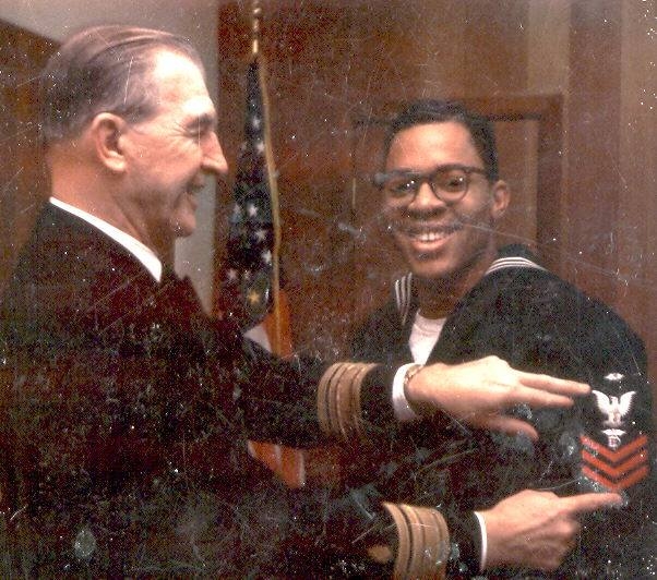 A photograph of Ronald Hilliard receiving a military commendation