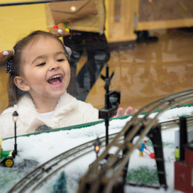 Girl looking at train