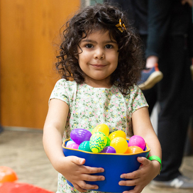 Eggstravaganza event holding eggs